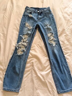 Women’s Distressed Blue Denim Jeans - Classic Ripped Style